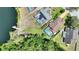 The home features a screened pool and is near a lake, offering a peaceful setting at 219 Breezy Oaks Ct, Davenport, FL 33896