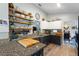 Charming kitchen featuring granite countertops and stainless steel appliances at 219 Breezy Oaks Ct, Davenport, FL 33896