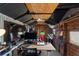 Professionally designed Shed interior with a workstation, lighting, and a modern aesthetic at 219 Breezy Oaks Ct, Davenport, FL 33896