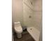 Bright bathroom featuring a tiled shower with updated fixtures at 220 E Desoto St # C, Clermont, FL 34711