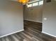 Open-concept living area with hard surface floors and natural lighting at 220 E Desoto St # C, Clermont, FL 34711