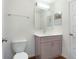 The bathroom features a stylish single vanity, framed mirror, and modern fixtures at 250 Beckenham Dr, Kissimmee, FL 34758