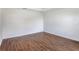 Clean, bright bedroom with wood-style flooring and ample natural light at 250 Beckenham Dr, Kissimmee, FL 34758