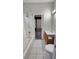 Clean bathroom featuring a shower/tub, vanity, and tile flooring at 2713 Barnsley Ln, Kissimmee, FL 34744