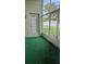 Enclosed patio area with sliding glass windows at 2713 Barnsley Ln, Kissimmee, FL 34744