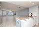Spacious open layout featuring a breakfast bar connecting the kitchen to the living area at 2725 N Poinciana Blvd # 147, Kissimmee, FL 34746