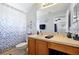 Well-maintained bathroom with a single sink vanity, shower with curtain, and ample storage at 2747 Lido Key Dr, Kissimmee, FL 34747