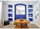 Cozy dining area featuring a modern table set, open shelving and ample natural light at 2747 Lido Key Dr, Kissimmee, FL 34747