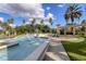 Beautiful fountain with palm trees and meticulous landscaping on a sunny day provides a tranquil community setting at 2747 Lido Key Dr, Kissimmee, FL 34747