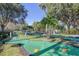 Mini golf area at a community amenity with lush landscaping and well-maintained courses at 2747 Lido Key Dr, Kissimmee, FL 34747