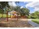 Community playground with swings, slide, and climbing dome offers a fun and safe play area for children at 2747 Lido Key Dr, Kissimmee, FL 34747