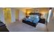 Relaxing bedroom with two nightstands and closet for ample storage at 2952 Beach Palm Ave, Kissimmee, FL 34747
