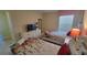 Comfortable twin beds with floral bedding and colorful decor at 2952 Beach Palm Ave, Kissimmee, FL 34747