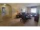 Comfortable living area with neutral decor and a cozy atmosphere, perfect for relaxing or entertaining guests at 2952 Beach Palm Ave, Kissimmee, FL 34747