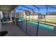 Enclosed pool area with screened-in lanai, ensuring privacy and safe Gathering fun in the sun at 2952 Beach Palm Ave, Kissimmee, FL 34747
