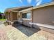 The home's front entrance with pavers, neutral paint scheme, and a covered entryway at 308 S Shadow Bay Dr, Orlando, FL 32825