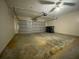 Spacious two-car garage with concrete flooring and garage door at 308 S Shadow Bay Dr, Orlando, FL 32825