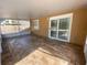 Covered patio featuring brick flooring and sliding glass doors to the house at 308 S Shadow Bay Dr, Orlando, FL 32825