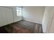 A simple bedroom includes carpet flooring, a window, and a closet at 312 Nine Iron Dr, Davenport, FL 33896