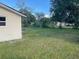 A well-kept backyard with mature trees provides plenty of privacy at 3135 Old Dixie Hwy, Auburndale, FL 33823