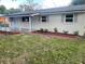 Charming single-story home featuring a fresh white exterior and a covered front porch at 3135 Old Dixie Hwy, Auburndale, FL 33823