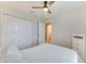 Bedroom featuring a bed, a dresser, and double closets at 314 Annabelle Way, Davenport, FL 33837