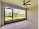 Spacious patio with a large window showcasing views of the outdoors at 314 Annabelle Way, Davenport, FL 33837