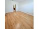 Neutral bedroom featuring wood laminate flooring at 3300 Whitestone Cir # 201, Kissimmee, FL 34741