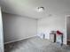 Bedroom features grey carpet, neutral walls, and a window with curtains for natural light at 340 Vail Dr, Winter Haven, FL 33884