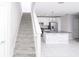 Modern kitchen boasts stainless steel appliances, granite countertops, and a stylish island at 3470 Beau Rd, Kissimmee, FL 34746