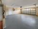 Spacious two car garage with ample room for parking and storage at 36 Inconnu Dr, Poinciana, FL 34759