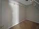 Spacious walk-in closet featuring built-in shelving for optimal storage and organization at 36 Inconnu Dr, Poinciana, FL 34759