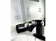 Modern bathroom with sleek fixtures, helpful instructions, and a well-lit vanity area at 4004 Santa Maria Dr # 108, Kissimmee, FL 34741