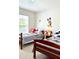 Bright bedroom featuring two twin beds with Mickey Mouse bedding and decor, perfect for children at 4004 Santa Maria Dr # 108, Kissimmee, FL 34741