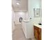Bright upstairs hallway with modern decor and a view of the stairway at 4004 Santa Maria Dr # 108, Kissimmee, FL 34741