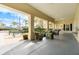 Relaxing community patio area with comfortable seating, perfect for enjoying the outdoors at 4004 Santa Maria Dr # 108, Kissimmee, FL 34741