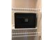Secure black safe installed on a shelf, offering peace of mind for storing valuables at 4004 Santa Maria Dr # 108, Kissimmee, FL 34741