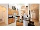 Bright kitchen with granite countertops, breakfast bar, and modern appliances at 4072 Oaktree Dr, Davenport, FL 33837