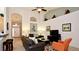 Bright living room features tile flooring, high ceilings, and an open floor plan at 4072 Oaktree Dr, Davenport, FL 33837