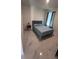 This bedroom features marble floors, curtains, a window, and a queen bed at 4147 Sherlock Ct, Orlando, FL 32824