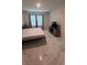 Bedroom featuring marble floors, neutral tones, and modern furnishings at 4147 Sherlock Ct, Orlando, FL 32824