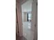 This is a view into a bedroom with marble floors, and curtains with a window at 4147 Sherlock Ct, Orlando, FL 32824