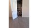 Unorganized closet with shelving and household items at 4147 Sherlock Ct, Orlando, FL 32824
