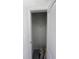 A closet with white walls and a single shelf with white trim at 4147 Sherlock Ct, Orlando, FL 32824