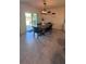 Inviting dining area with access to the outdoor patio, great for summer evenings at 4147 Sherlock Ct, Orlando, FL 32824
