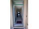 Inviting foyer leading to a spacious hallway with tile flooring at 4147 Sherlock Ct, Orlando, FL 32824