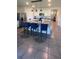 Modern kitchen with granite countertops and stylish pendant lighting above the island at 4147 Sherlock Ct, Orlando, FL 32824