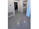 Bright laundry room with washer and dryer and shelving at 4147 Sherlock Ct, Orlando, FL 32824