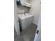 A view into the laundry room featuring a washer and dryer with white trim at 4147 Sherlock Ct, Orlando, FL 32824