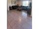 Cozy living room with neutral tones and comfortable seating, filled with natural light at 4147 Sherlock Ct, Orlando, FL 32824